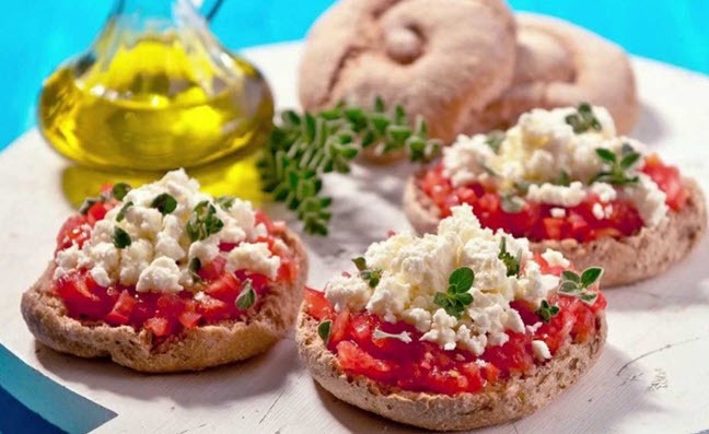 Dakos - olive oil-drizzled barley rusks and feta What to Eat in Crete in August